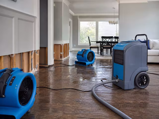 Water damage drying equipment in a home